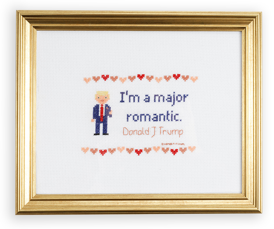 A cross stitched Donald Trump with a quote by him that reads, “I’m a major romantic.”