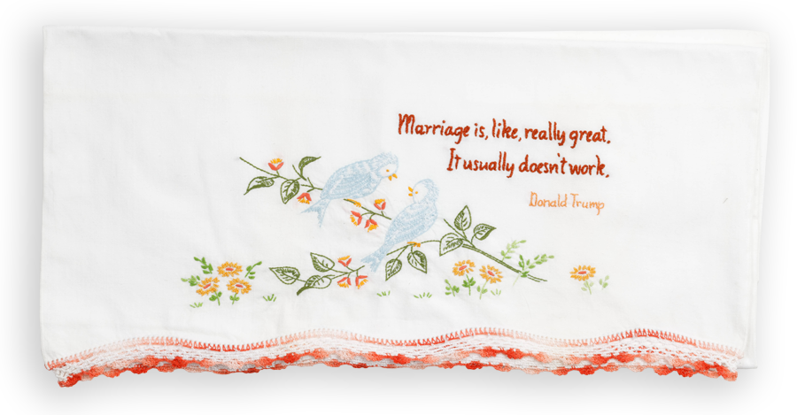 A embroidered pillowcase, with a quote by Donald Trump, that reads: “Marriage is, like, really great. It usually doesn’t work.”