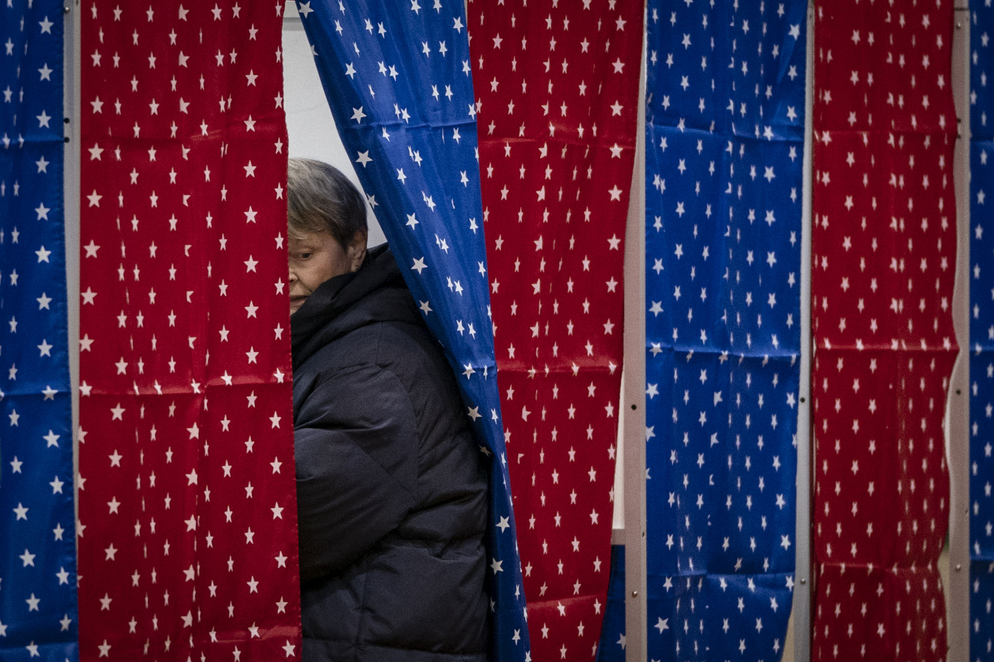A woman votes during the 2020 New Hampshire primary.