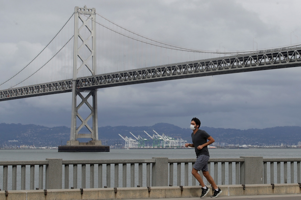 Lone runner in the Bay Area. | AP Photo