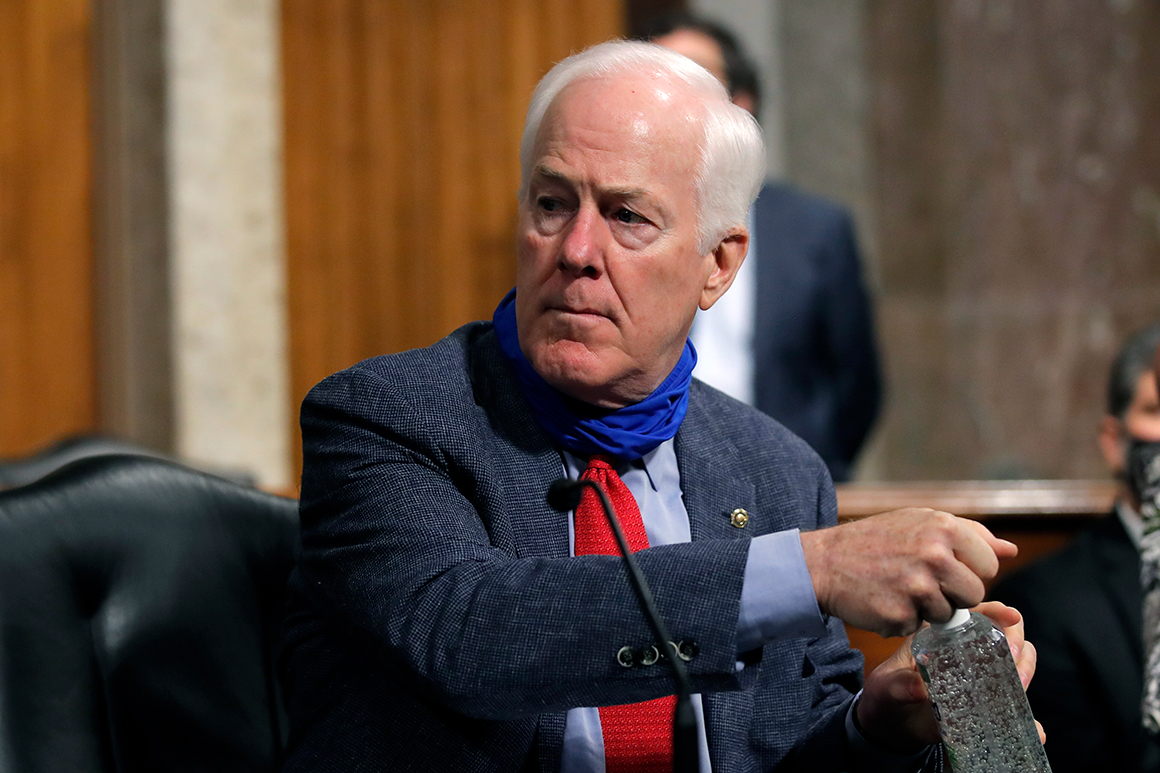 Sen. John Cornyn, R-Texas, uses hand sanitizer before a Senate Judiciary Committee business meeting on Capitol Hill on June 11, 2020 in Washington, DC. Senate committee gathered to vote on authorizing 35 subpoenas into the origins of the FBI’s Russia investigation, dubbed Crossfire Hurricane. (Photo by Carolyn Kaster-Pool/Getty Images)