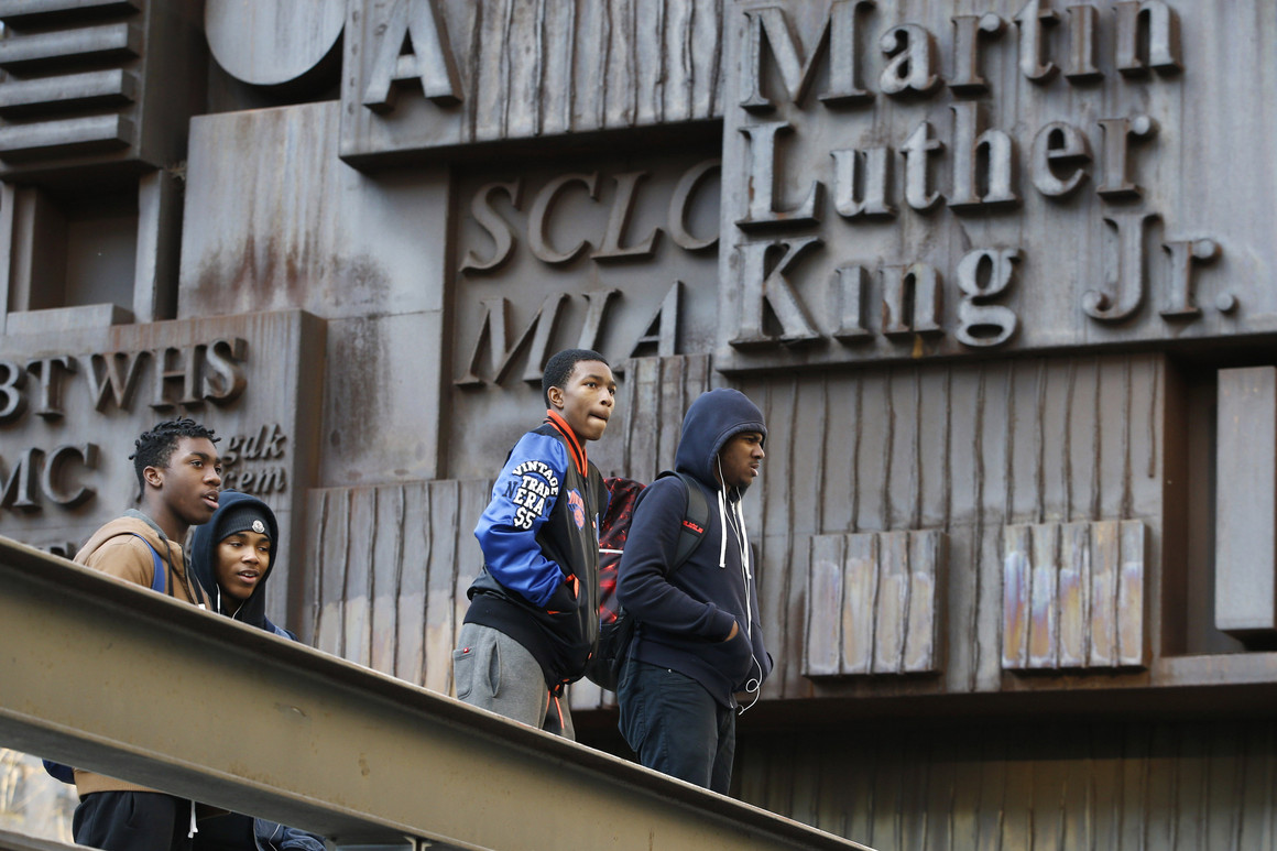 Students congregate on the steps of Martin Luther King Jr. High School on Manhattan's Upper West Side. | AP Photo