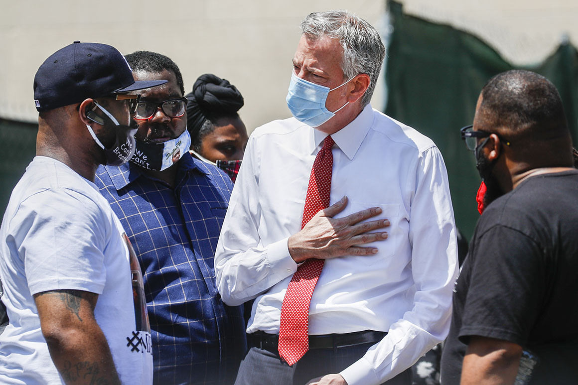 Terrence Floyd, brother of the deceased George Floyd, speaks with New York City Mayor Bill de Blasio during a rally at Cadman Plaza Park. | AP Photo