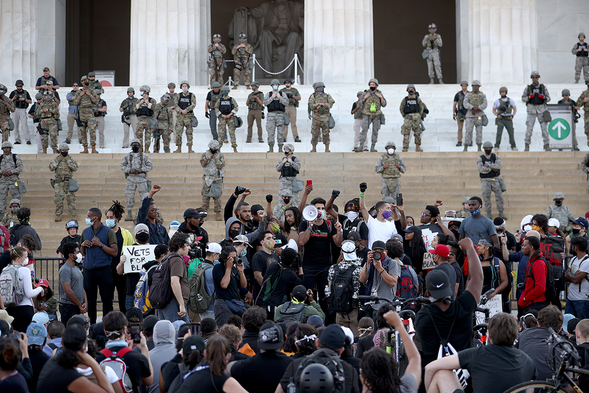 National Guardsmen on steps of the Lincoln Memorial monitoring protesters