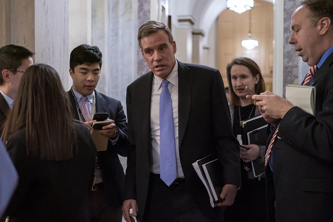 Senate Intelligence Vice Chair Mark Warner, D-Va., departs the Capitol as the Senate finishes its work for the day in the impeachment trial of President Donald Trump on charges of abuse of power and obstruction of Congress, in Washington, Friday, Jan. 24, 2020. (AP Photo/J. Scott Applewhite)