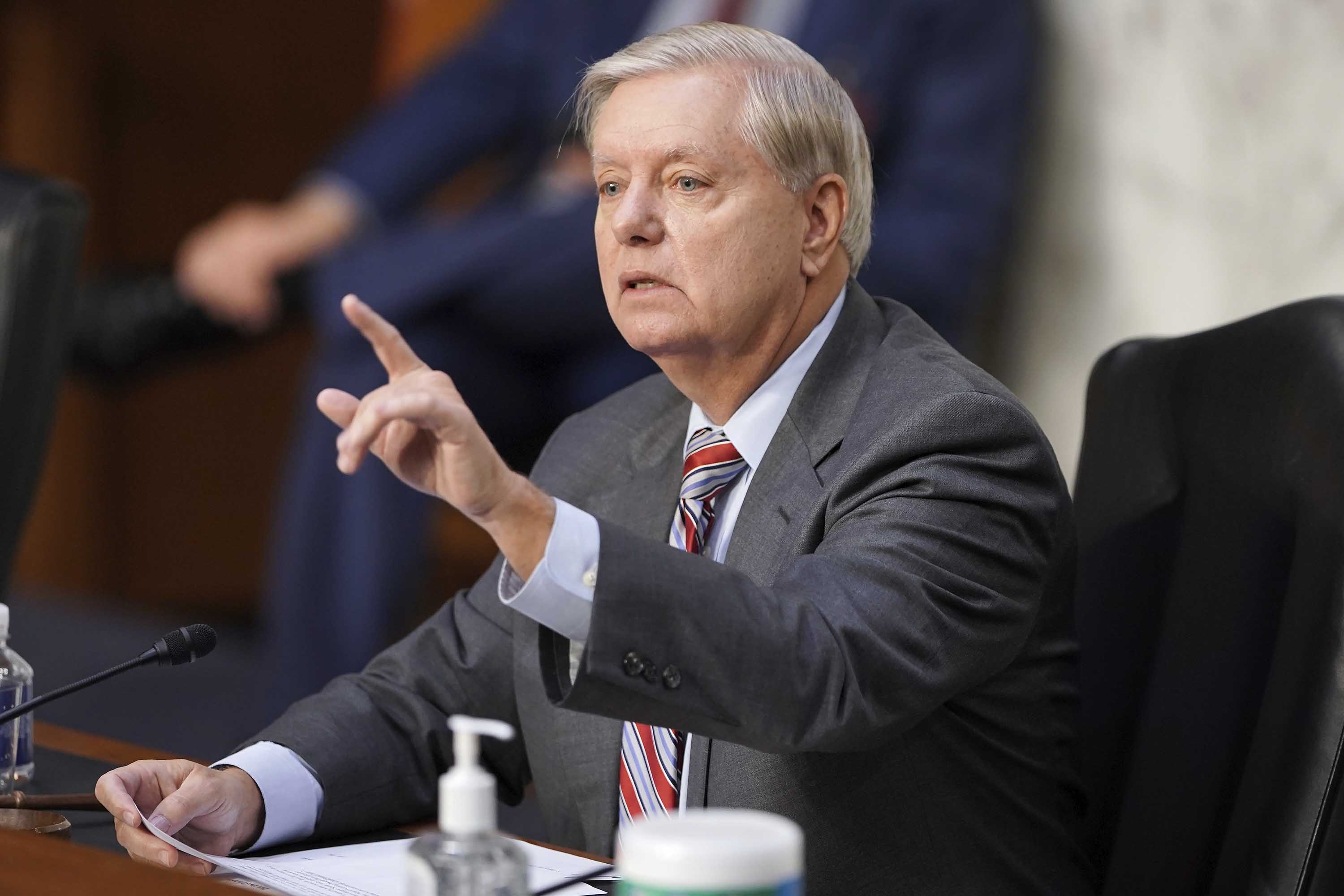 Sen. Lindsey Graham, R-S.C., speaks during the confirmation hearing for Supreme Court nominee Amy Coney Barrett, before the Senate Judiciary Committee, Thursday, Oct. 15, 2020, on Capitol Hill in Washington. (Greg Nash/Pool via AP)